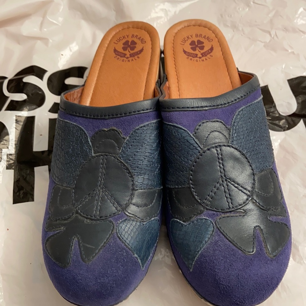 Lucky Brand clogs.